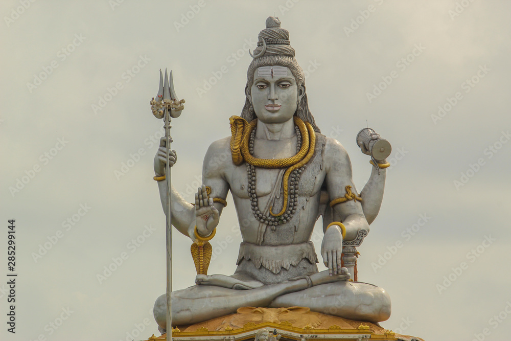 Fototapeta premium Murdeshwar is a town in Bhatkal Taluk of Uttara Kannada district in the state of Karnataka, India. The town is located 13 kms from the taluk headquarters of Bhatkal. Murdeshwar is famous for the world