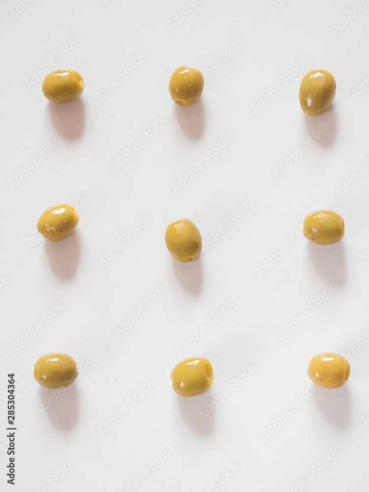 Pitted olives pattern on white background