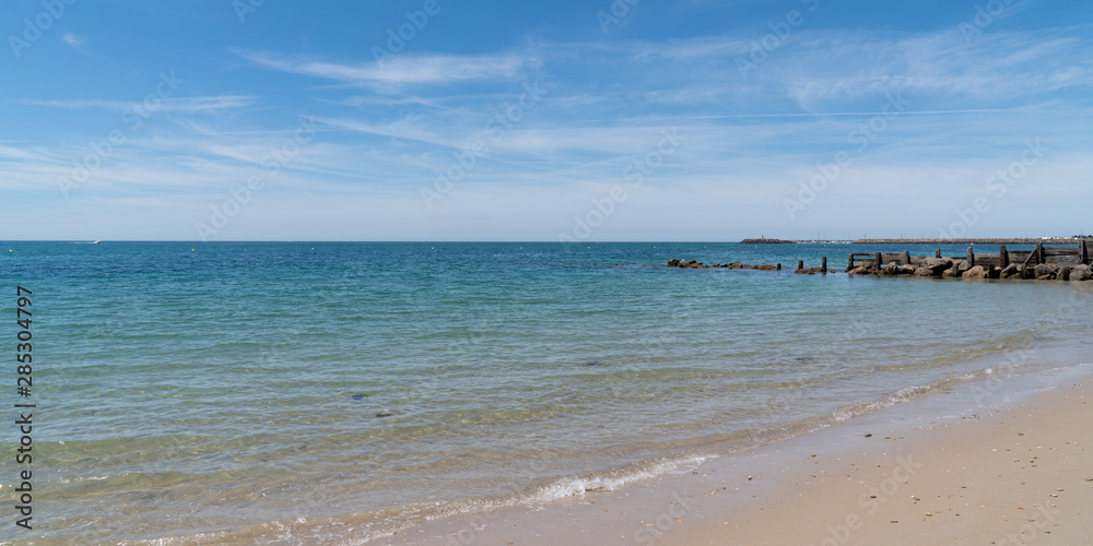 Atlantic sea coast beach from a French Ile de Noirmoutier in web banner template header panorama