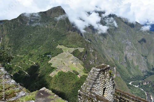 Aerial view of Machu Picchu, Peru. It is a 15th-century Inca citadel, located in the Cusco Region, Urubamba Province, Machupicchu District. photo