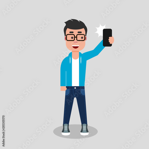A young man is taking a selfie. Boy taking pictures of himself with phone camera.He is standing and smiling in jeans and sweatshirt, holding the phone. Vector stock illustration, flat style, clip art.