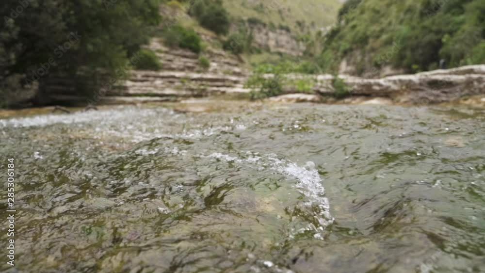 River stream flows in slow motion in Nature Reserve Cavagrande, Sicily River stream flows in slow motion in Nature Reserve Cavagrande, Sicily