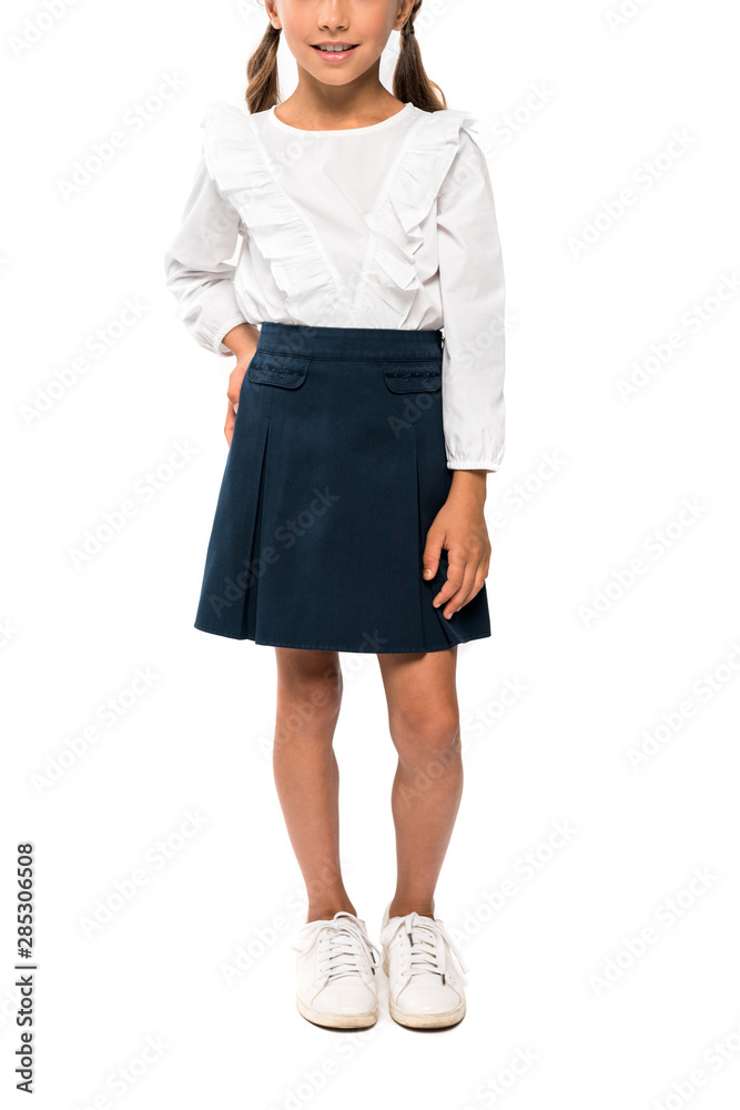 cropped view of school kid standing with hand on hip isolated on white