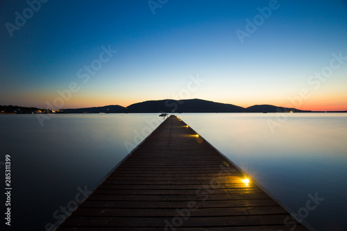Fototapeta Naklejka Na Ścianę i Meble -  Sunset at a jetty