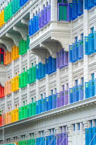 Photography Colorful rainbow pastel building with facade windows background