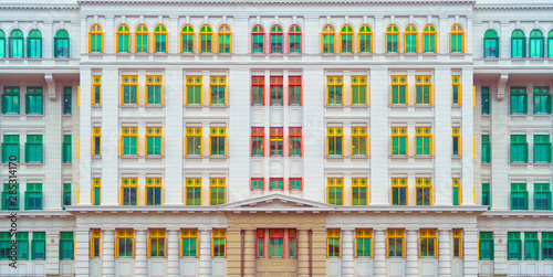 Colorful rainbow pastel building with facade windows background. Architecture building design in Former Hill Street Police Station near Clarke Quay, Singapore City. photo