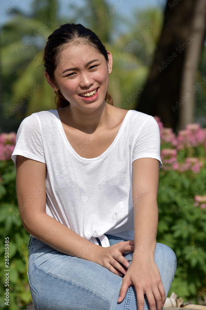 A Filipina Female Smiling