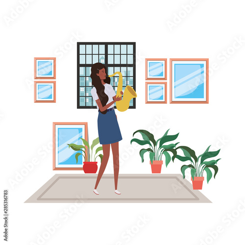 young woman with saxophone on white background