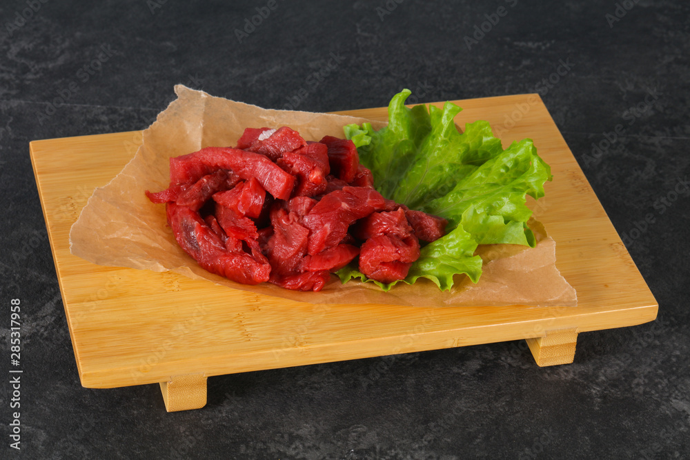 Raw beef meat sliced for cooking