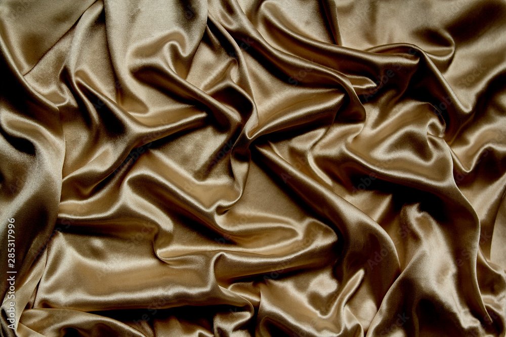 beautiful satin draped with soft folds fabric, silk cloth background, close-up, copy space beautiful satin draped with soft folds fabric, silk cloth background, close-up, copy space