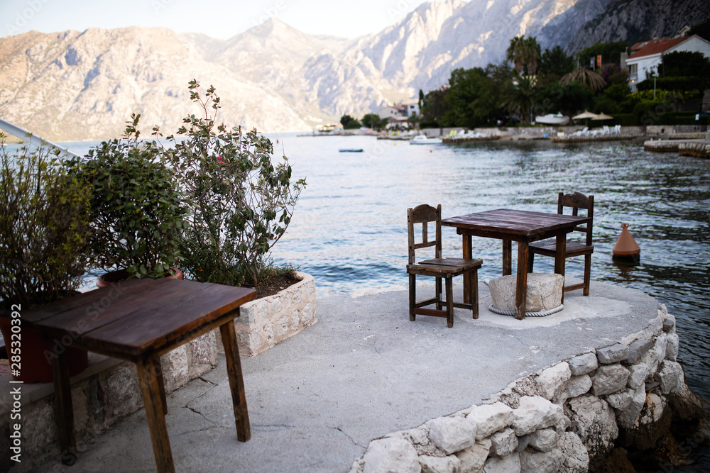 Restaurant on the beach with mountain on background Restaurant on the beach with mountain on background