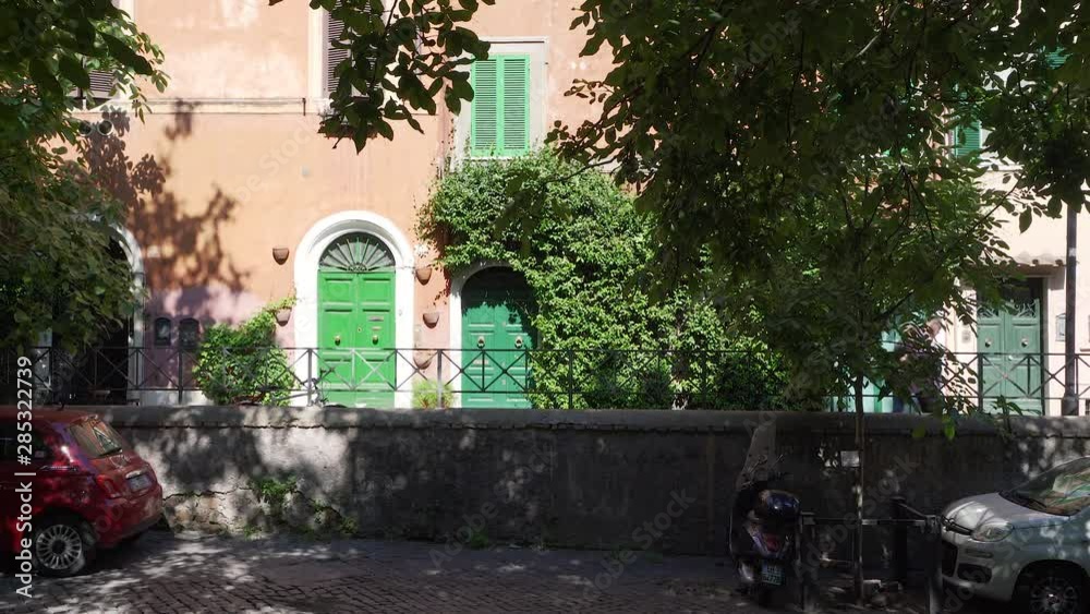 The picturesque Rione Trastevere on a summer morning, in Rome, Italy. The picturesque Rione Trastevere on a summer morning, in Rome, Italy.