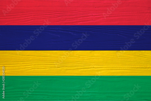 Mauritius flag painted on wooden texture