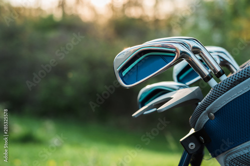 Close-up of golf clubs.