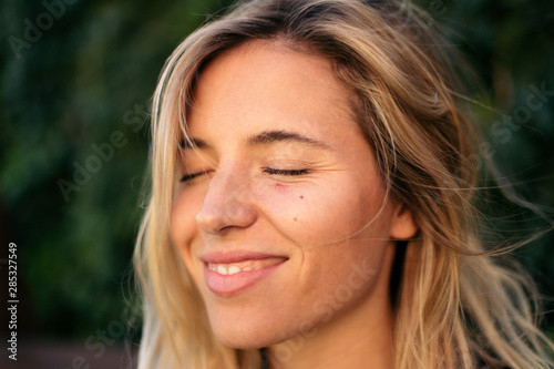 Close up of a smiling woman photo