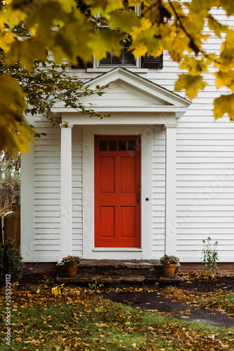 red door of a classic New England home
