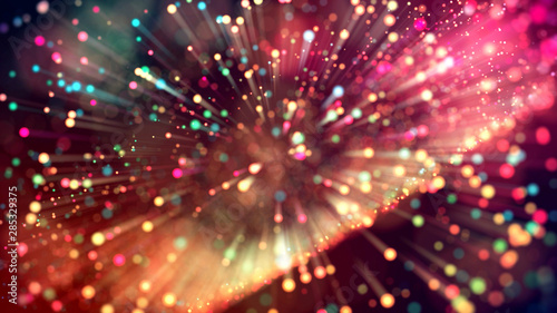 3d abstract beautiful background with colorful glowing particles, depth of field and bokeh effect. Abstract explosion of multicolored shiny particles or light rays like laser show.