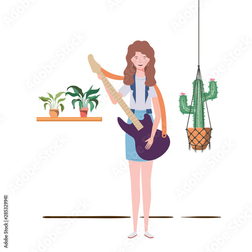 woman with electric guitar and houseplants on macrame hangers of background