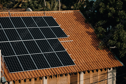 Modern Solar Energy Panels Battery on House Roof