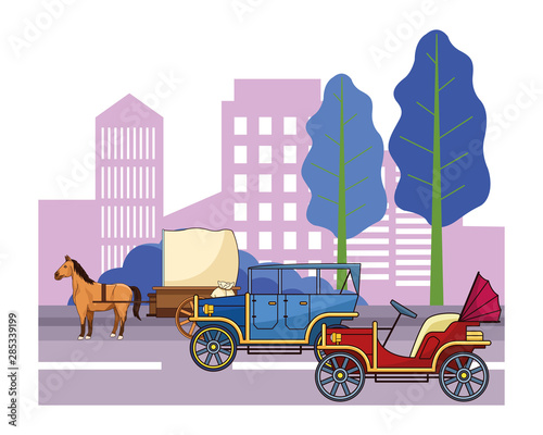 Classic cars and horse carriages vehicles