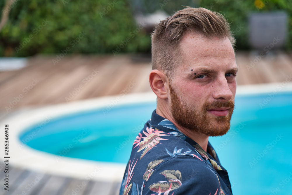 a red beard young male model portrait