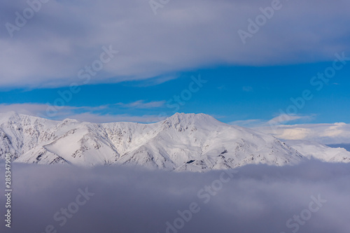 aerial view of mountains of snow-capped andes mountains © Pedro Suarez