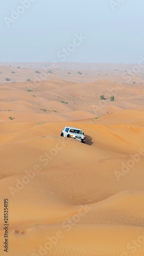 car in desert dubai