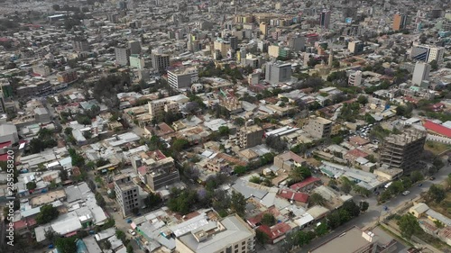 Retreating aerial footage of central Mek'ele, urban development in fast growing city in Ethiopia photo