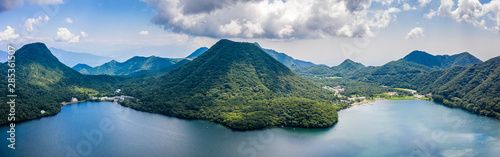 Aerial drone photo - Mt. Haruna rises above Lake Haruna.  Gunma Prefecture, Japan. photo