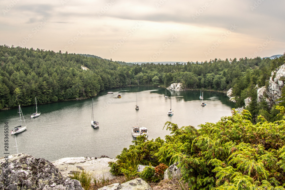 Fototapeta premium boats at anchor in Covered Portage, Killarney, Ontario, Canada