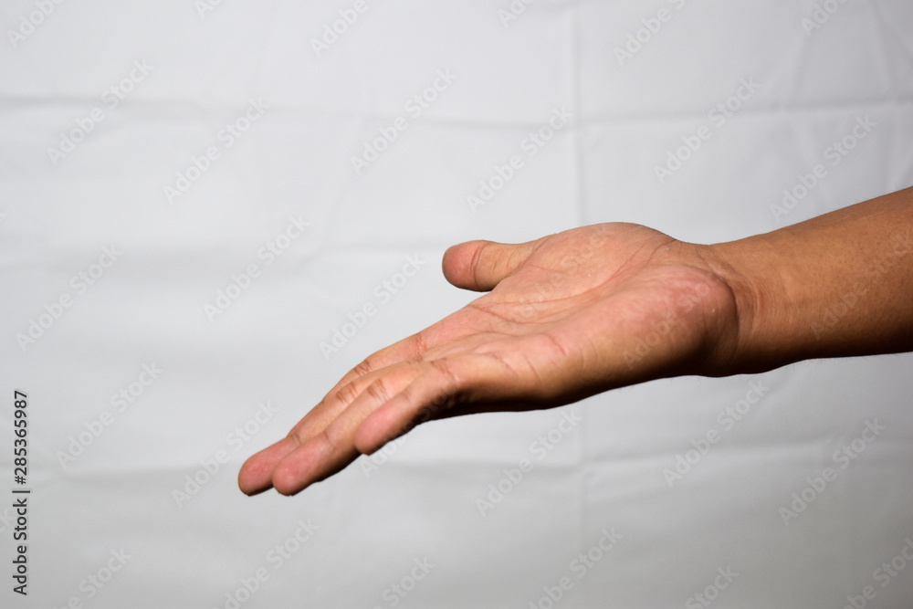 Obraz premium Close up Asian man shows hand gestures it means Look at that! isolated on white background
