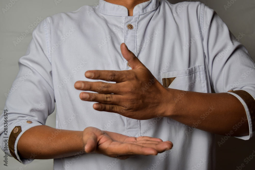 Close up Asian man shows hand gestures it means human emotion and expression isolated on white background
