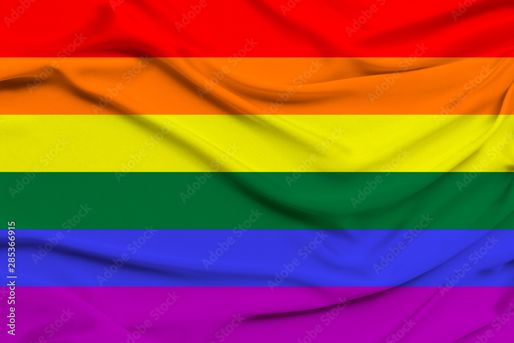 Fototapeta premium LGBT rainbow flag, Pride flag, Freedom flag - the international symbol of the lesbian, gay, bisexual and transgender community, the concept of the human rights movement