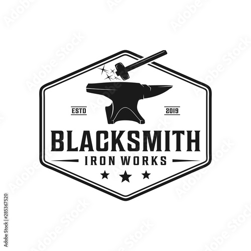Blacksmith anvil badge vintage logo. Iron works, metal works retro hipster logo