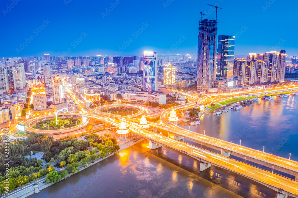Fototapeta premium Cityscape of Harbin. Songhuajiang Gonglu Bridge. Located in Harbin, Heilongjiang, China.