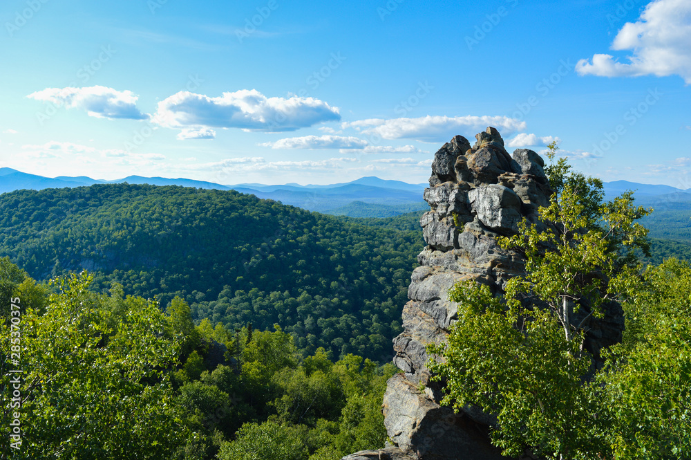 View from the top of Chimney Mountain in the Adirondack Mountain Range, featuring the hike's focal point - the 