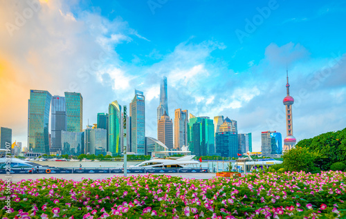 The morning of Lujiazui in Shanghai, China, with the prospect of flower beds © Weiming