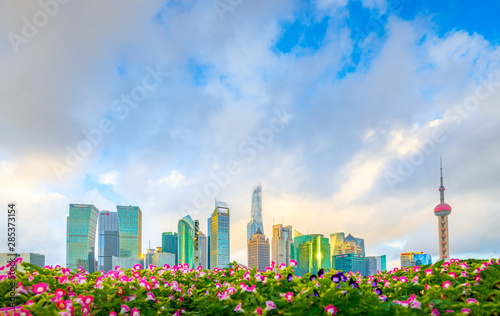 The morning of Lujiazui in Shanghai, China, with the prospect of flower beds © Weiming