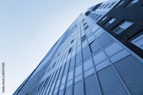 Apartment house exterior with windows and balconys