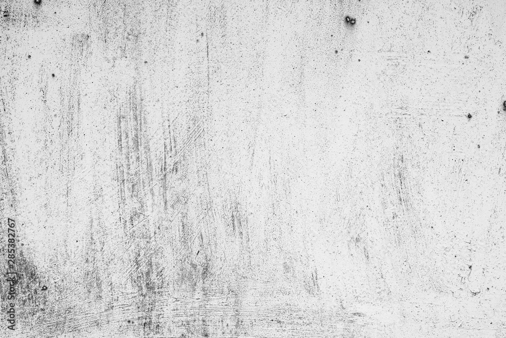 Naklejka premium Texture of a concrete wall with cracks and scratches which can be used as a background