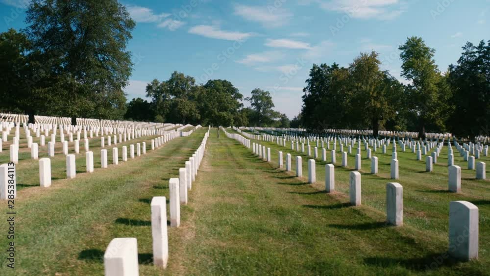 Arlington Cemetery Grave yard grass trees nature historic Sky Clouds sliding shot 4k