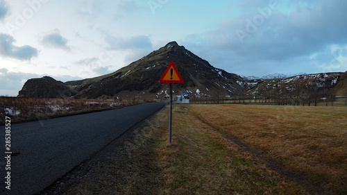 Exclamation road sign with mountain in the background close to Skogafoss - Iceland