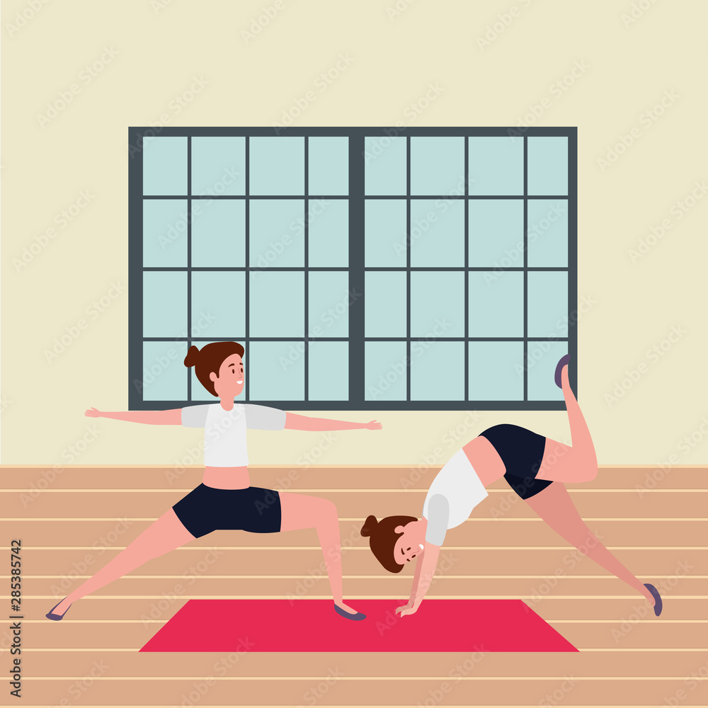 Fototapeta premium beauty girls couple practicing pilates position in the gym