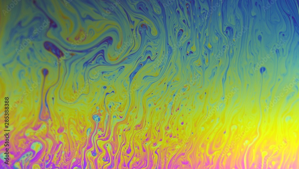 Colorful soap bubble surface psychedelic movement macro
