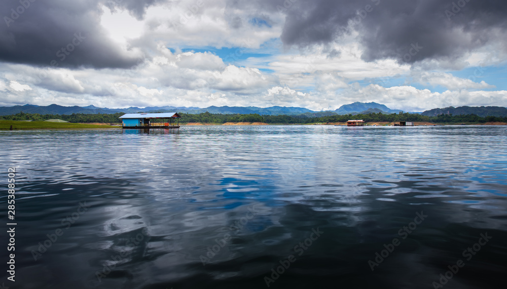 Landscape of wooden raft resort floating in the Vajiralongkorn Dam also called the Khao Laem Dam at kanchanaburi,thailand
