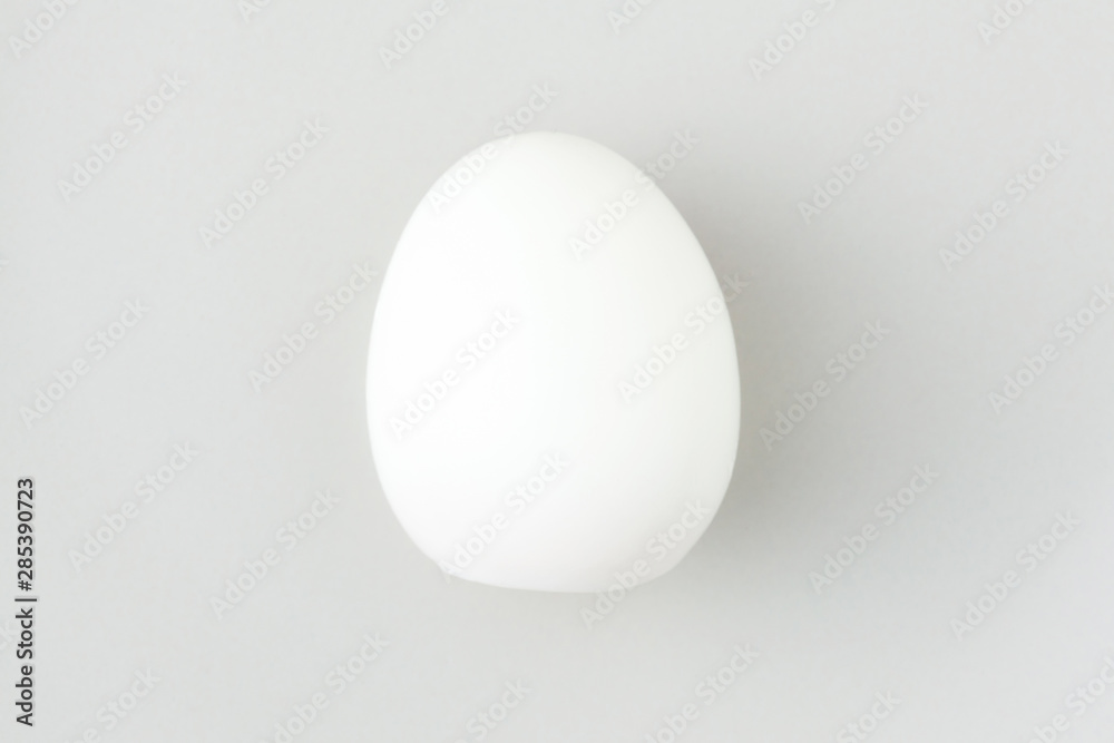 The boiled egg isolated on white plate with space for copy. The boiled egg isolated on white plate with space for copy.