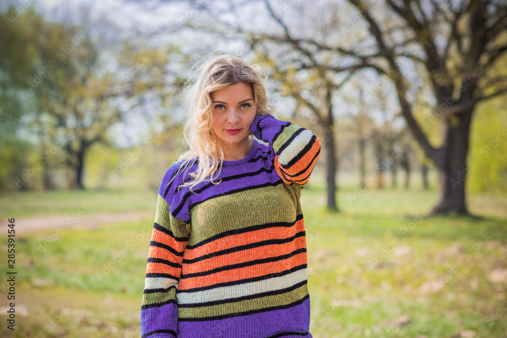 Autumn colorful trendy clothes, fall concept, cozy mood, plus size model in warm clothes Autumn colorful trendy clothes, fall concept, cozy mood, plus size model in warm clothes