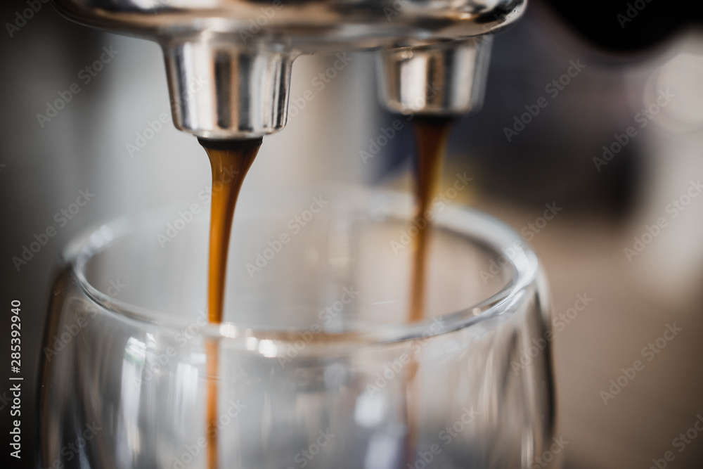 close up cup of coffee espresso with coffee machine close up cup of coffee espresso with coffee machine