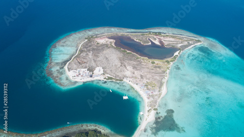 Caribbean: Vacation in the blue sea and deserted islands. Aerial view of a blue sea with crystal water. Great landscape. Beach scene. Aerial View Island Landscape Los Roques photo