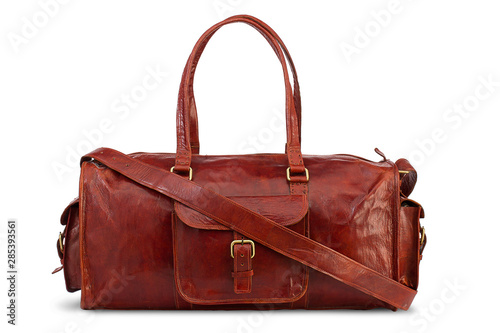 Bulky travel luggage brown leather bag isolated on white background